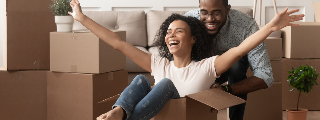 Young couple moving into new house